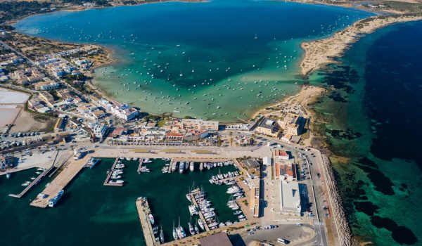 Beautiful turquoise bay at Formentera, aerial view. how to immigrate to Cyprus